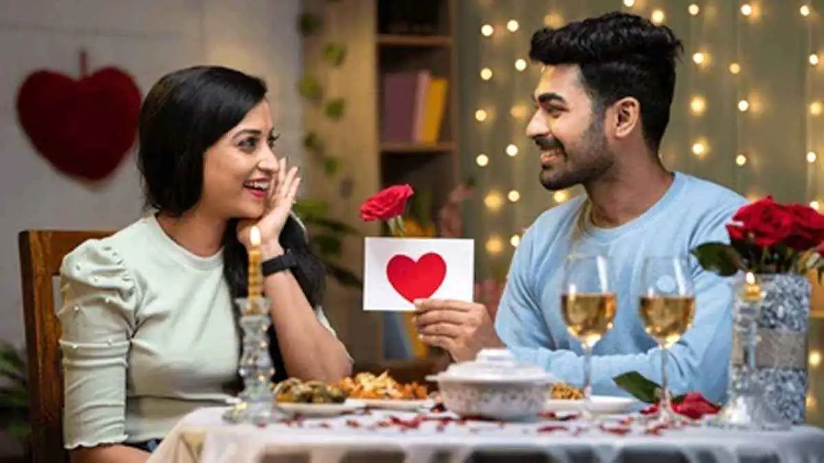 A couple celebrating Propose Day 2025, with a romantic setting and a heartfelt gift exchange.