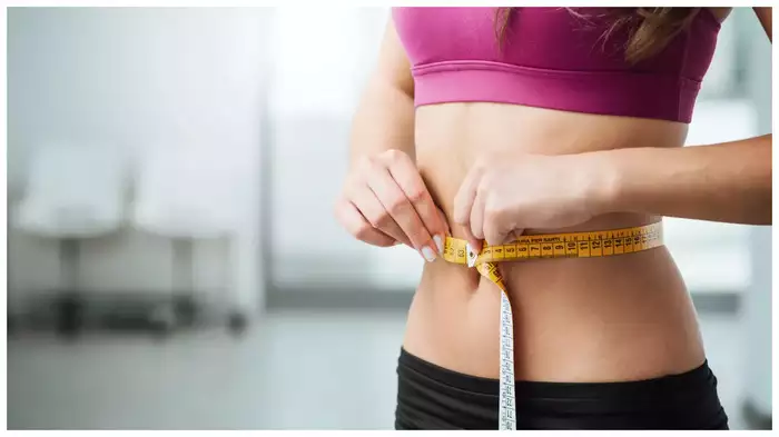 A fit and healthy person indicating weight loss, fitness, and overall well-being.