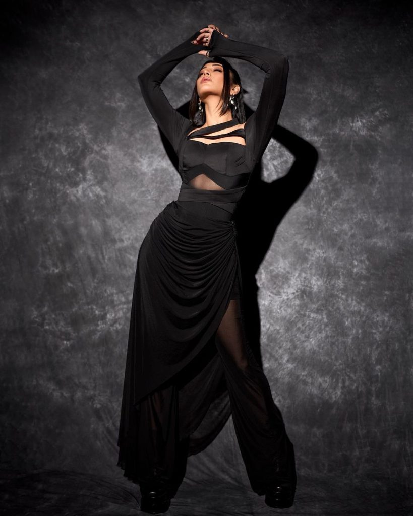 Shruti Haasan performing a classical dance in a traditional Indian attire.