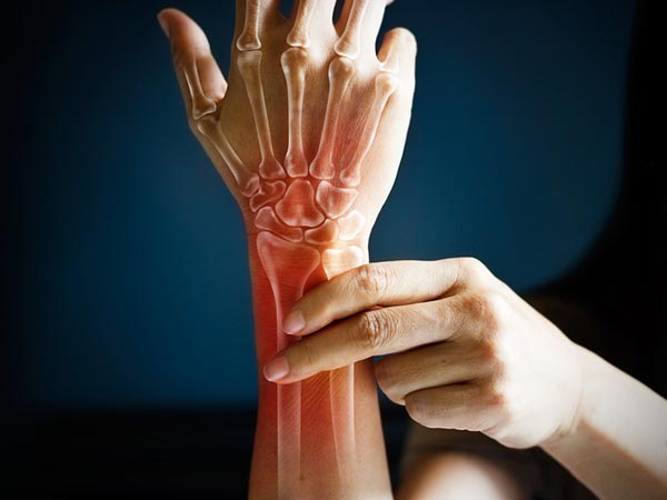 A person running or stretching, symbolizing strong bones and healthy joints.